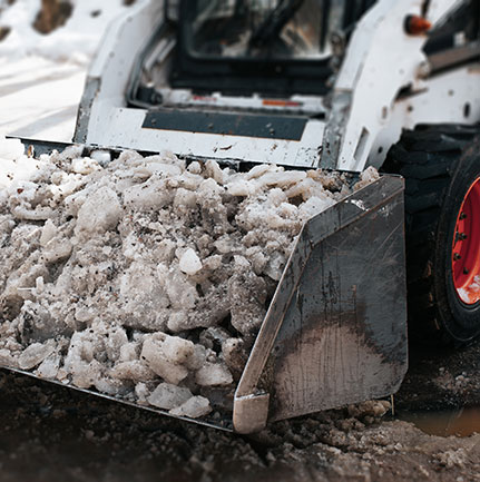 Parking lot and sidewalk ice and snow removal by Commercial Asphalt Repair in Grand Rapids, Minnesota.
